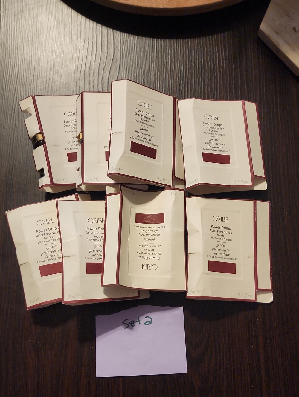 Oribe Power Drops Color Preservation Booster - Burgundy and Cream Packets